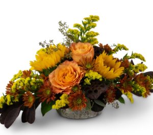 orange and yellow fall flowers in arrangement