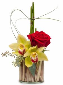 Simple and elegant, roses and orchids, but packed with style - we know everyone will love it!